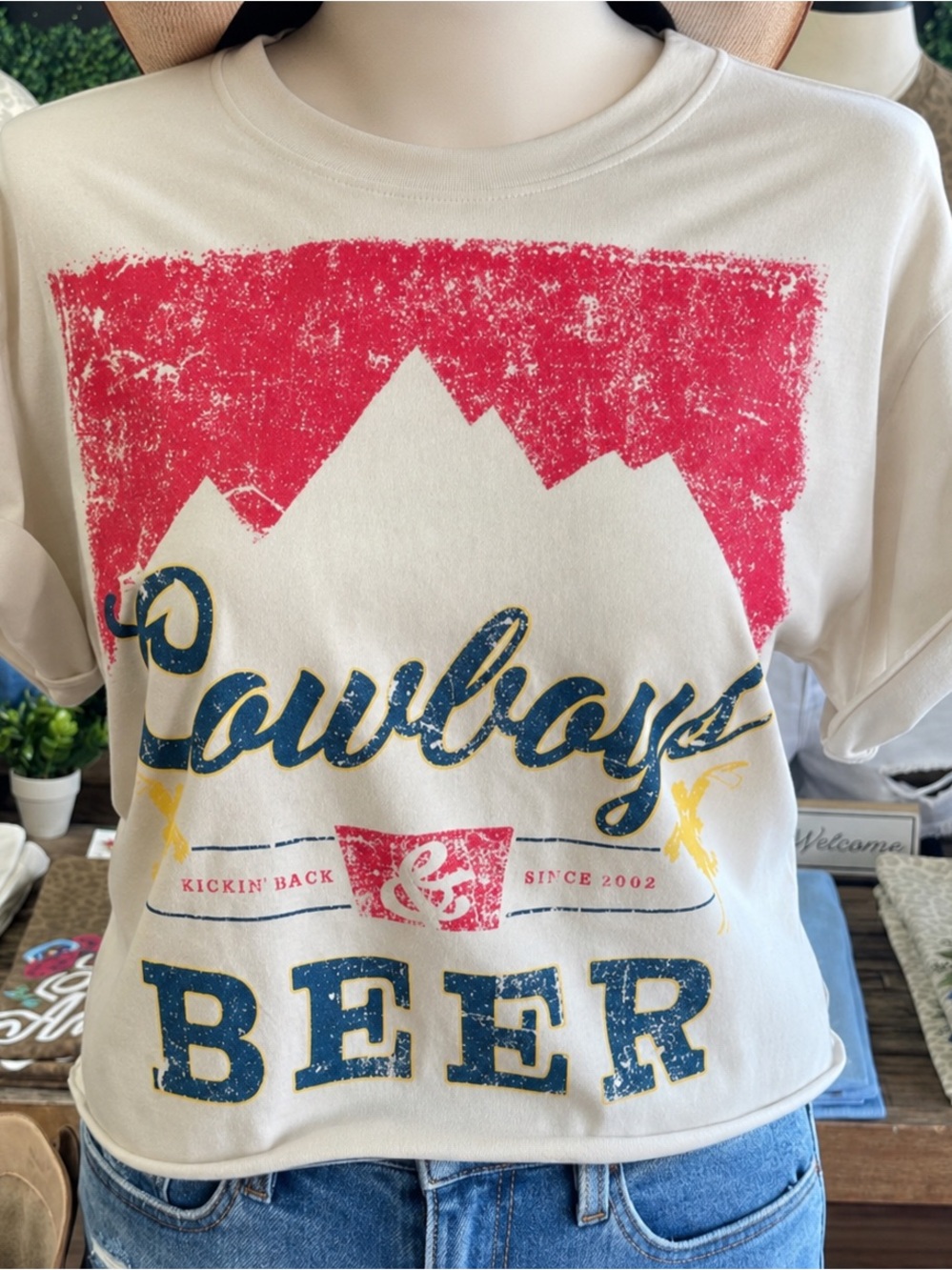 New Cowboys Beer Graphic Tee in Cream with Red, Blue & Yellow Print- large
